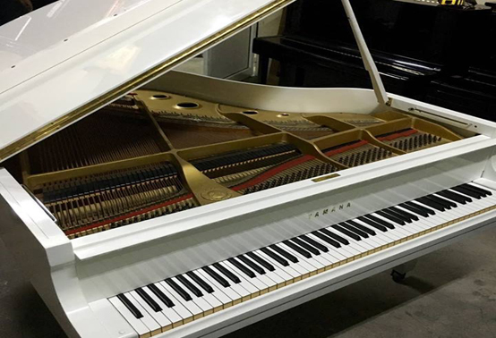 Yamaha C2 Grand white piano available for rent from Strings and Keys